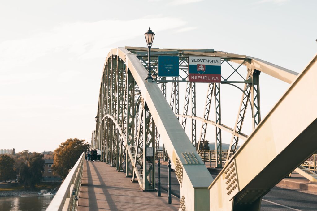 A scenic view of Maria Valeria Bridge connecting Hungary and Slovakia over the Danube River.